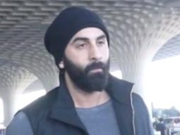 Ranbir Kapoor gets clicked at the airport sporting a black beanie as he poses with fans