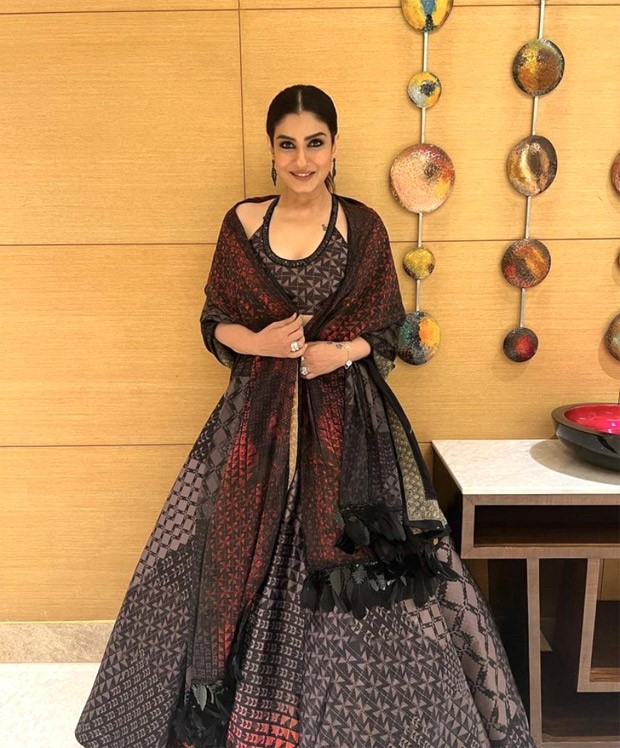 Raveena Tandon in a beautiful black and red lehenga by Manish Malhotra embodies ethnic fashion at its finest Raveena Tandon in a beautiful black and red lehenga by Manish Malhotra embodies ethnic fashion at its finest