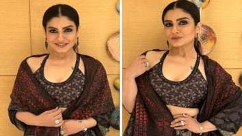 Raveena Tandon in a beautiful black and red lehenga by Manish Malhotra embodies ethnic fashion at its finest