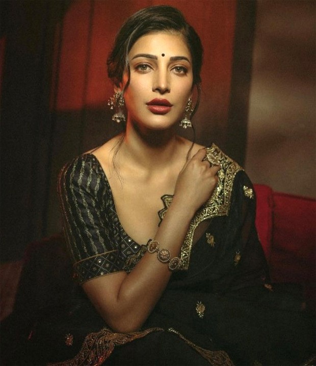 Shruti Haasan channels her desi vibes in a black and golden saree