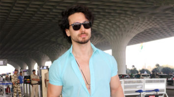 Tiger Shroff looks handsome as he gets clicked in a blue shirt at the airport