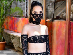 Uorfi Javed poses for paps sporting a black see-through dress