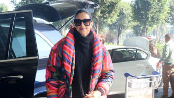 Deepika Padukone walks in style at the airport donning a multicolored oversized jacket