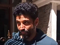 Farhan Akhtar waves at paps sporting a casual look