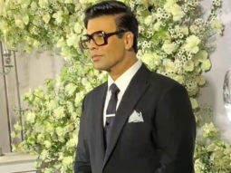 Karan Johar attends Sidharth-Kiara’s reception dressed in a black suit