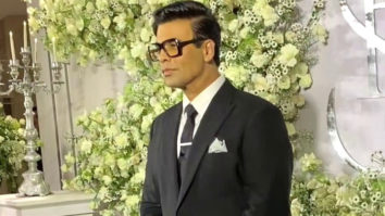 Karan Johar attends Sidharth-Kiara’s reception dressed in a black suit