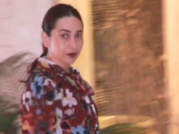 Karisma Kapoor cheerfully waves at paps dressed in a flowy outfit
