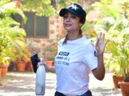 Malaika Arora pets her dog before leaving for her daily gym session