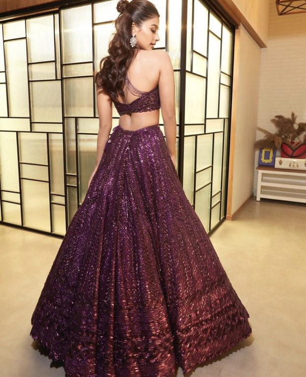 Pooja Hegde danced the night away at her brother's sangeet wearing a purple sequin lehenga that cost Rs 1.88 Lakh