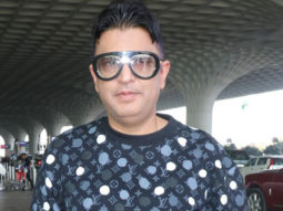 Producer Bhushan Kumar greets paps at the airport