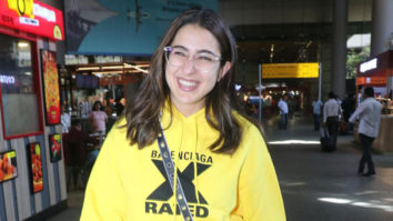 Sara Ali Khan sports a comfortable airport look in a yellow hoodie