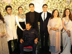 Sidharth and Kiara pose for a family photo at their reception