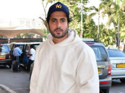 Sunny Singh Nijjar slays the casual airport look as he poses for paps in a white hoodie
