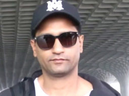 Vicky Kaushal poses for a selfie with a fan at the airport