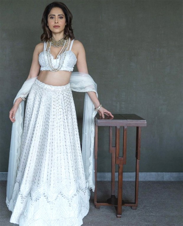 Nushrratt Bharuccha, wearing an ivory lehenga, epitomises ethnic beauty and grace