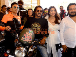 Photos: Producer Anand Pandit and Kabzaa stars Shriya Saran and Upendra ride bikes on Mumbai streets