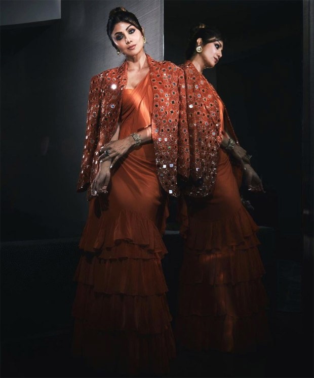 With an orange saree with ruffles and a mirror-work jacket, Shilpa Shetty proves how her dynamic sense of style is just growing better with time With an orange saree with ruffles and a mirror-work jacket, Shilpa Shetty proves how her dynamic sense of style is just growing better with time