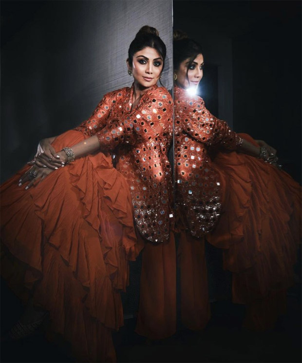 With an orange saree with ruffles and a mirror-work jacket, Shilpa Shetty proves how her dynamic sense of style is just growing better with time With an orange saree with ruffles and a mirror-work jacket, Shilpa Shetty proves how her dynamic sense of style is just growing better with time