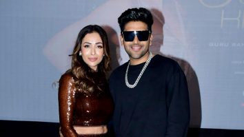 Malaika Arora & Guru Randhawa look stunning as they pose for paps during an event