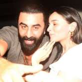 Ranbir Kapoor and Alia Bhatt pose cutely for the paparazzi; share a kiss
