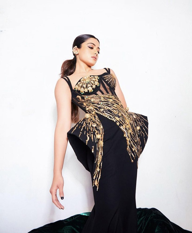 Rashmika Mandanna in structured black and gold corset gown by Falguni & Shane Peacock made sure she was the star of the night at NMACC Rashmika Mandanna in structured black and gold corset gown by Falguni & Shane Peacock made sure she was the star of the night at NMACC