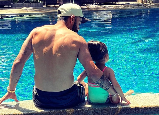 Virat Kohli and daughter Vamika beat scorching summer heat in pool; see picture : Bollywood News