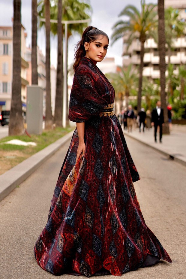 Cannes 2023 Influencer Niharika Nm turns the red carpet into her own personal runway in a wine-coloured gown by Shantanu & Nikhil