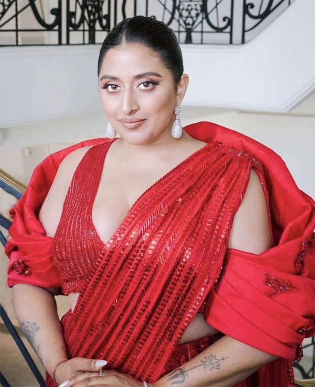 Cannes 2023: Raja Kumari makes the most of her sparkling appearance in a red sequin saree gown by Manish Malhotra