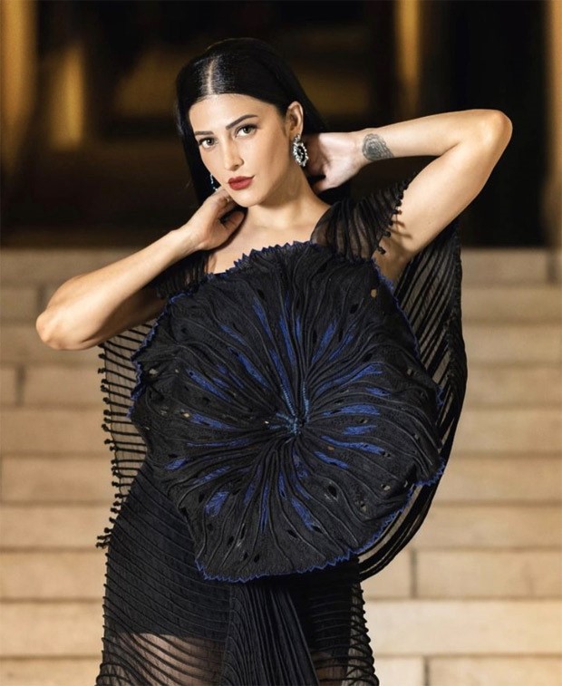 Cannes 2023: Shruti Haasan blooms in a sheer look and with an oversized flower