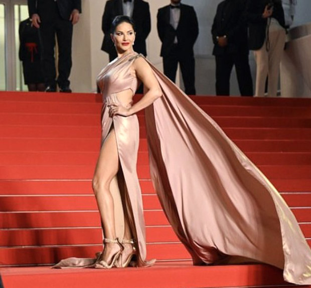 Cannes 2023: Sunny Leone cranks up the heat on the Croisette in a gorgeous pink cut-out gown as she attends the Kennedy premiere