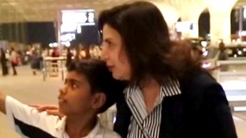 Farah Khan poses with little fans at the airport