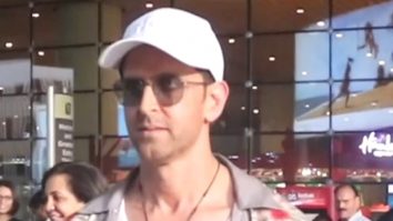 Hrithik Roshan poses with fans as he returns from IIFA