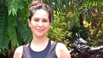 Kim Sharma waves at paps as she gets clicked outside her gym