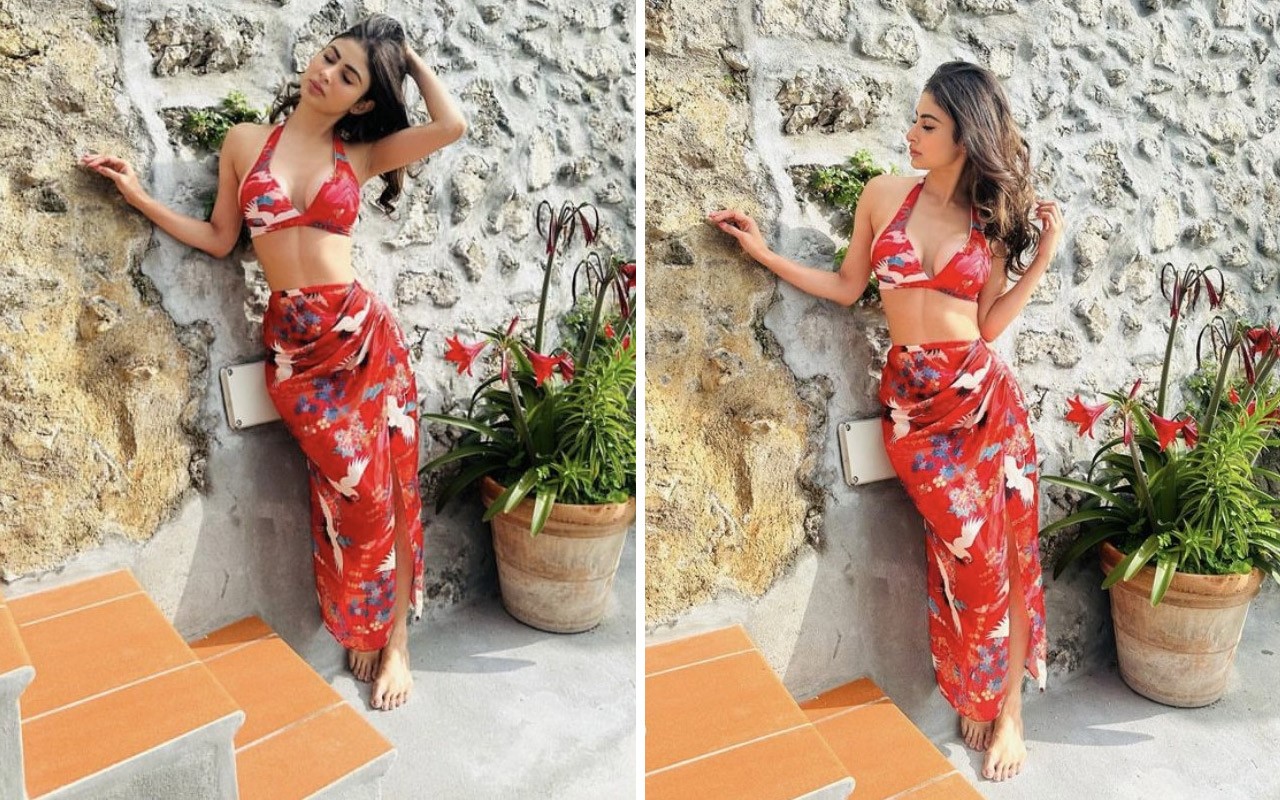 https://stat4.bollywoodhungama.in/wp-content/uploads/2023/05/Mouni-Roy-blooms-in-her-mesmerizing-red-sarong-and-bikini-adding-a-touch-of-paradise-to-her-vacation-style.jpg