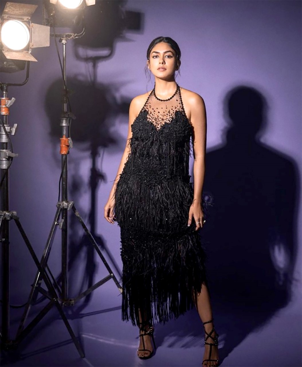 Mrunal Thakur amps up the glamour quotient in a stunning black beaded fringe dress