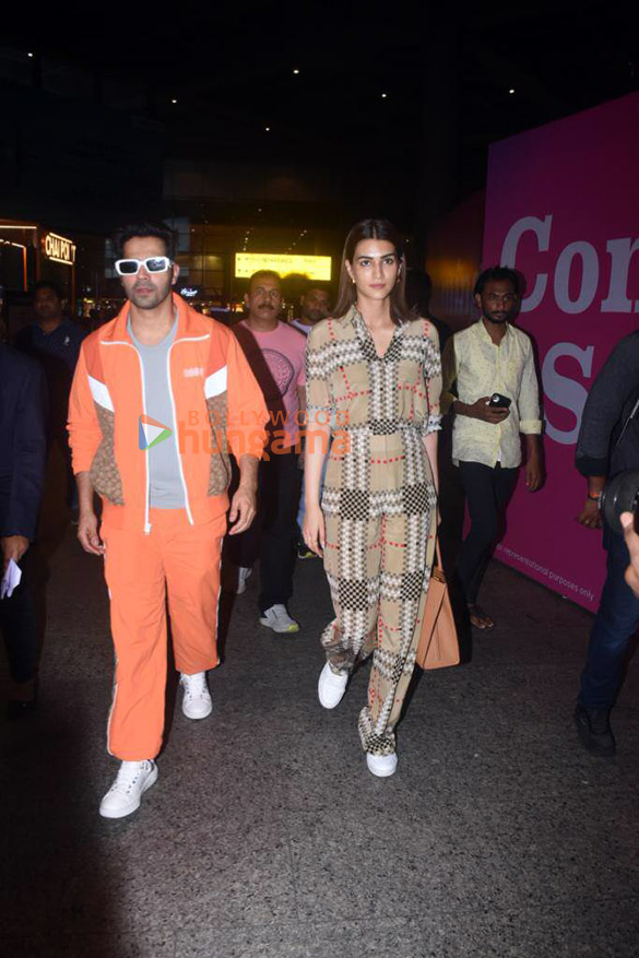 Photos: Varun Dhawan and Kriti Sanon snapped at the airport