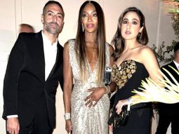 Sara Ali Khan smiles for the camera with Naomi Campbell in a heart-patterned Moschino dress and heart-shaped purse at Cannes 2023