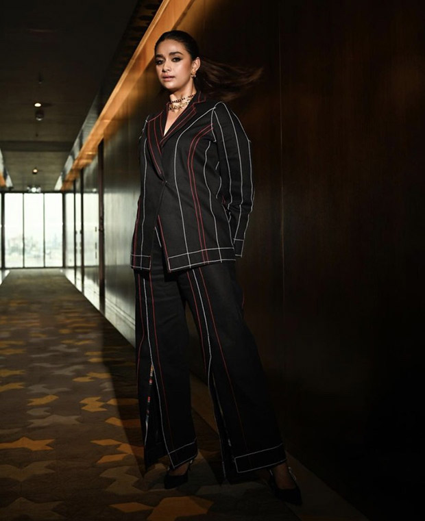 Keerthy Suresh shows us her very chic side in black striped pantsuit for the promotions of her film Maamannan