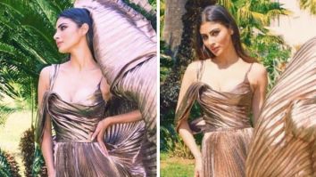 Mouni Roy gives us a hefty dose of glam in a stunning metallic dress that features multiple pleats and a daring side slit