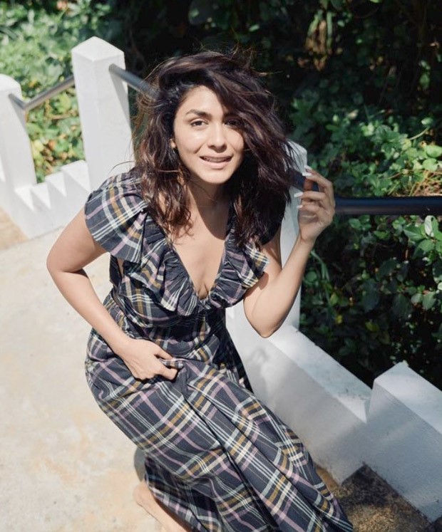 Mrunal Thakur's cutout chequered maxi dress is ideal for leisurely summer days