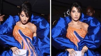 Nora Fatehi set the IIFA 2023 stage ablaze in an orange and blue swirl-embellished gown, with a captivating flouncy blue cape
