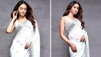 Rakul Preet Singh is a timeless vision in an ivory mirror work saree, reflecting elegance and grace