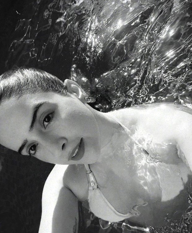 Sanya Malhotra makes waves in a vibrant colour-blocked bikini, embracing the summer vibes while diving into pool 