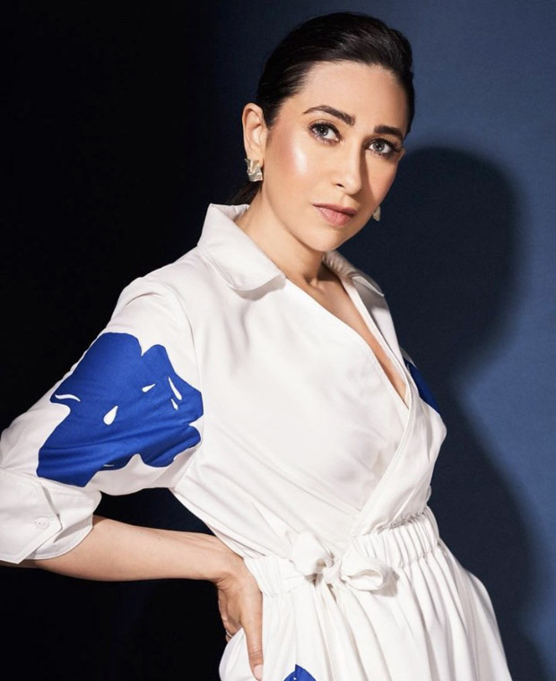 Karisma Kapoor's white and blue midi dress from Lovebirds Studio exudes a relaxed summery mood