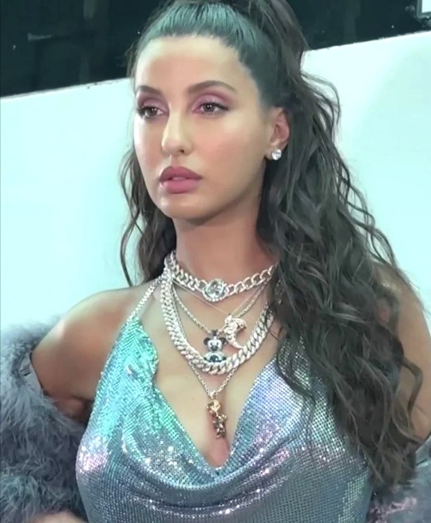 Nora Fatehi in a shiny chainmail top and inside out denim jeans is breaking fashion boundaries