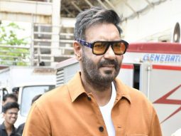 Ajay Devgn looks dashing as she strikes a pose for paps