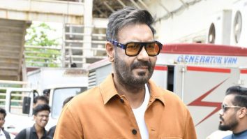 Ajay Devgn looks dashing as she strikes a pose for paps