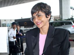 Mandira Bedi gets clicked at the airport as she greets paps