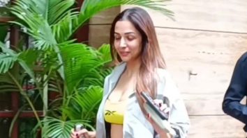 Neon Queen Malaika Arora waves at paps as she gets clicked