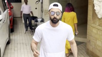 Ranbir Kapoor waves at paps sporting a white tshirt and denims
